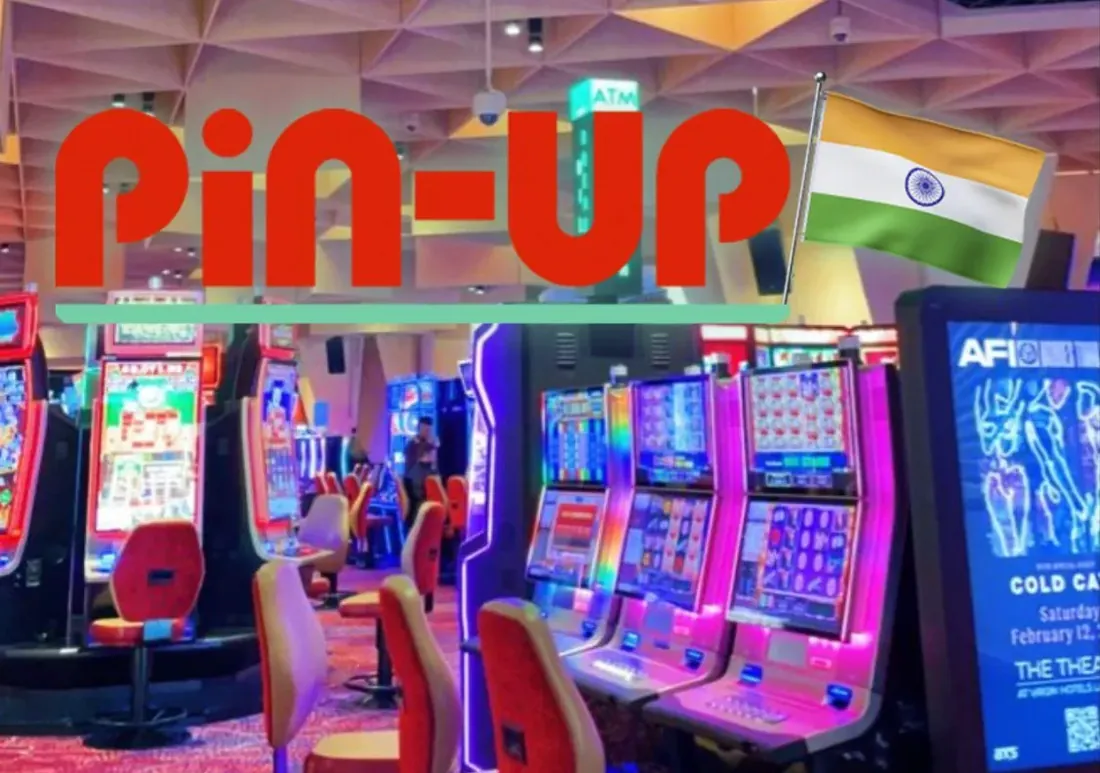Pin-Up logo with an Indian flag above rows of slot machines in a casino hall